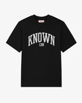 Black Christian streetwear T-shirt with white "Known" chest print, relaxed fit faith-based tee