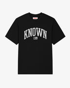 Black Christian streetwear T-shirt with white "Known" chest print, relaxed fit faith-based tee